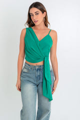 Blusa cruzada asimétrica con lazo lateral
