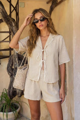 Blusa fluida rayas lazos