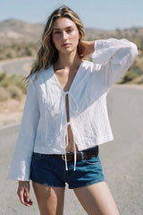 Blusa lazos manga larga