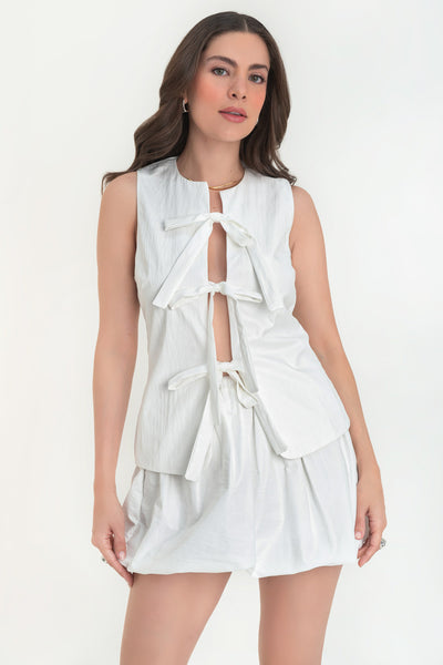 Blusa sin mangas con lazos frontales