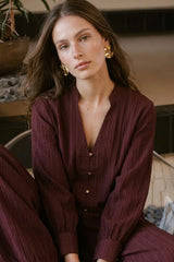 Long-sleeve button-up blouse