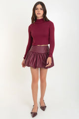 Falda corta globo de efecto piel