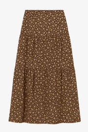 Falda midi de estampado floral, cintura alta con pretina elástica, corte en a y capas de olanes en bajo.