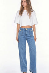 Pantalón de denim cropped flare bolsillos con botón