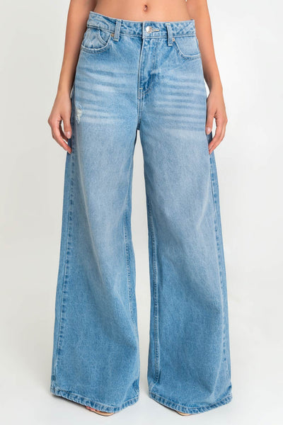 Pantalón de denim fit wide leg low waist