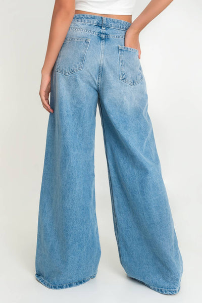 Pantalón de denim fit wide leg low waist