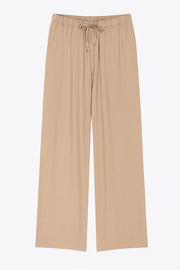 Pantalón fluido de lino, fit recto, bolsillos delanteros, cintura media con pretina elástica y jareta frontal ajustable.