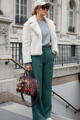 Pantalón pinzas pretina pasada