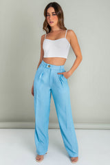 Pantalón wide leg con pinzas botón lateral en contraste