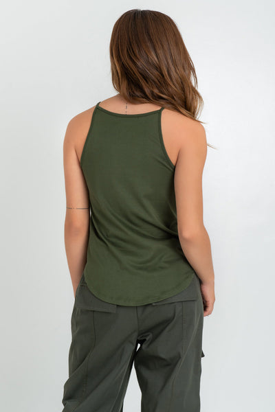 Top de cuello halter sin mangas, tirantes finos, bajo curveado y silueta ligeramente oversized.