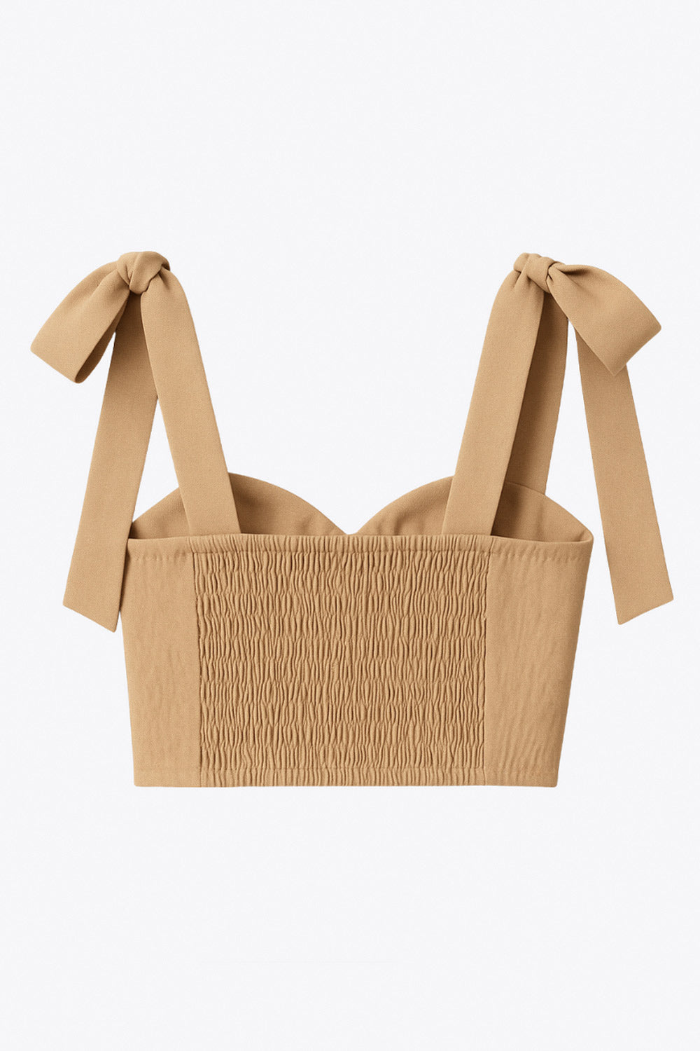 Crop top de lino, fit ajustado, escote corazón con cortes decorativos y detalles plisados, costuras frontales, tirantes con nudo amarrable y fruncido en espalda.