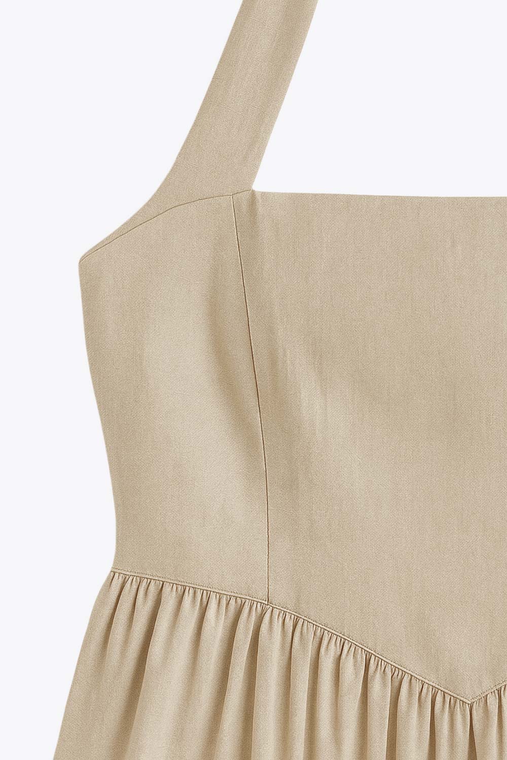 Vestido midi de cuello halter, sin mangas, escote recto, corte en a, corte v en cintura con plisados y fruncido en espalda.